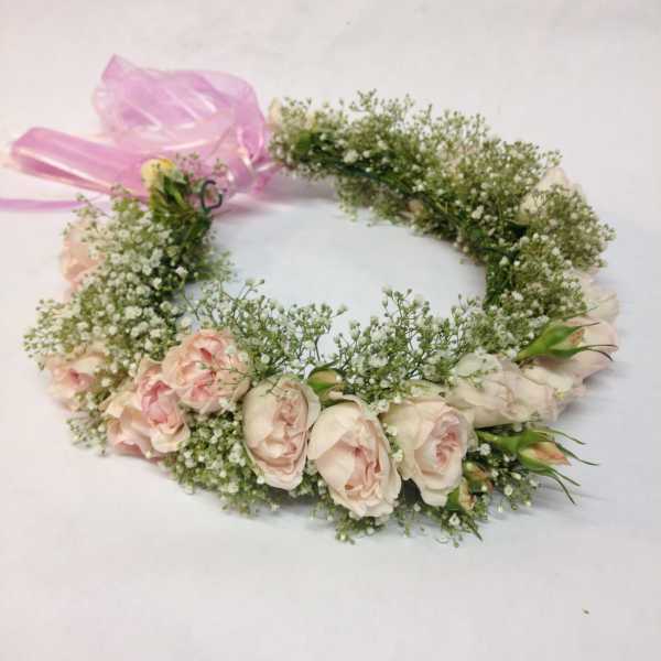 Pink rose flower crown with baby's breath and a pink ribbon