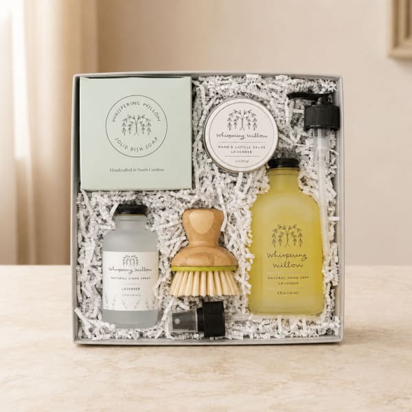 Lavender-themed gift box with soap, spray, salve, and brush