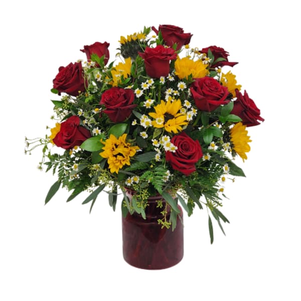 Bouquet of red roses and yellow daisies in a burgundy vase