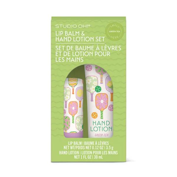 Green boxed lip balm and hand lotion set with floral packaging