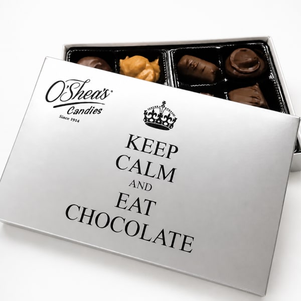 Box of assorted chocolates with a printed lid