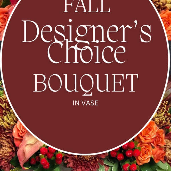 Fall designer's choice bouquet in a vase with mixed autumn flowers