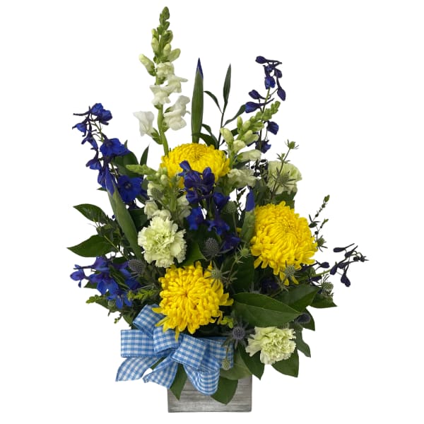 Yellow and blue mixed flower arrangement in a wooden box with a gingham bow