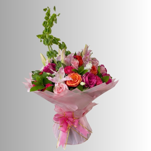 Pink and orange mixed bouquet wrapped in pink paper