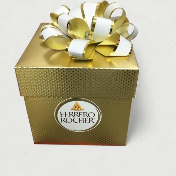 Gold Ferrero Rocher gift box with a white and gold ribbon bow