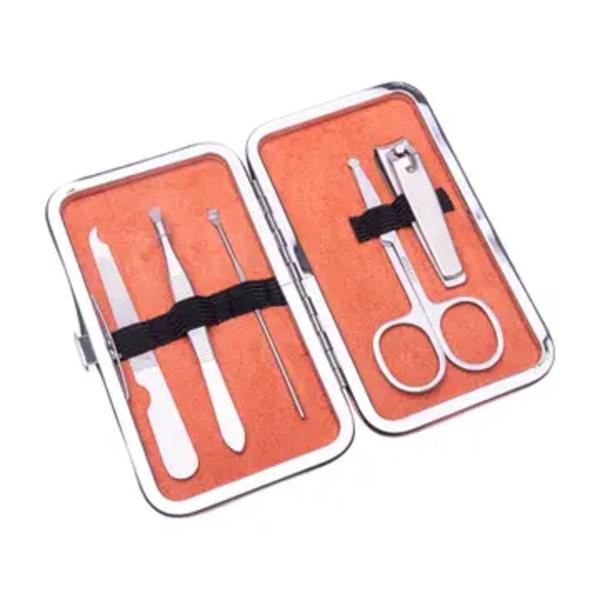 Manicure kit in an open case with scissors, clippers, and tools