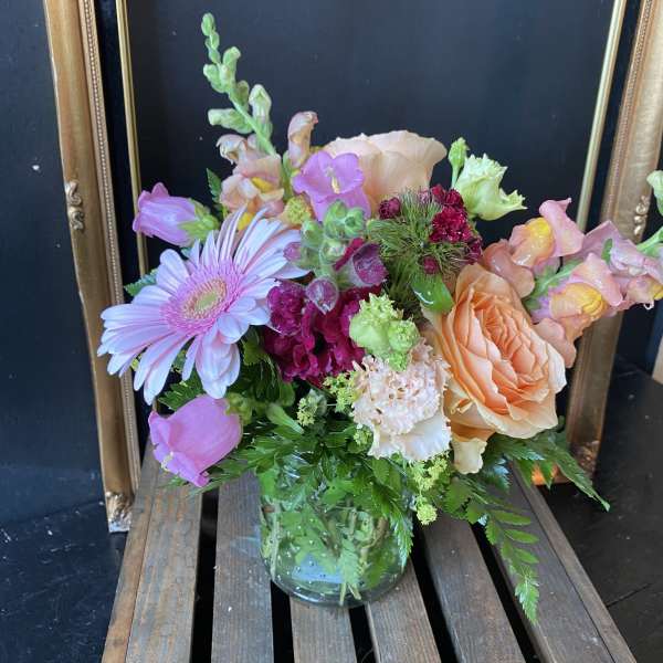 Mixed pastel bouquet in a glass vase
