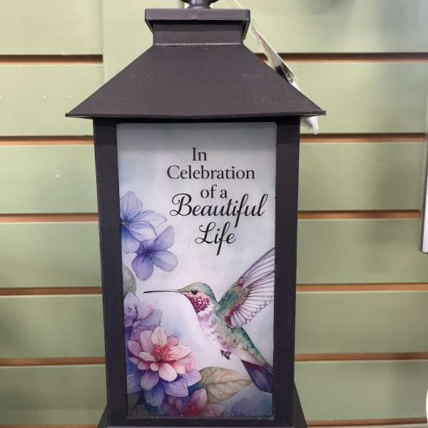 Black lantern with a hummingbird and floral memorial message