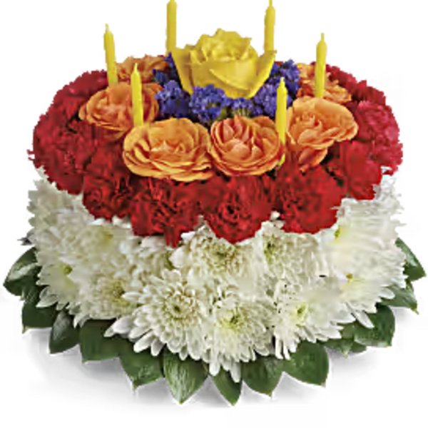 Tiered floral cake with candles in red, orange, white, and yellow blooms