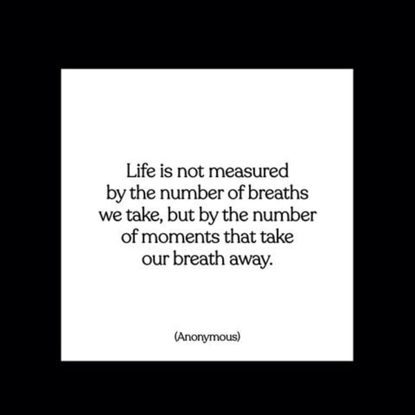 White quote card with black text on a black background