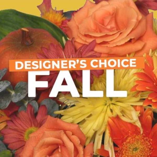 Fall floral arrangement with orange roses and yellow daisies