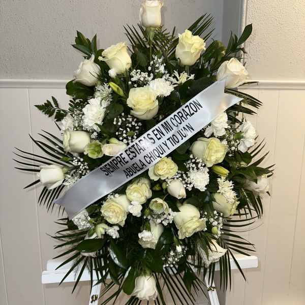 STAN FUNEBRE WITH VARIETIES OF WHITE FLOWERS
