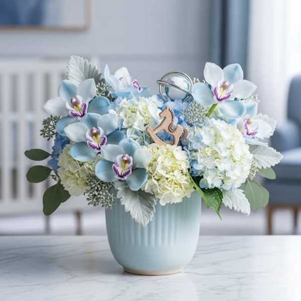 Blue and white floral arrangement in a light blue vase with a small rocking horse ornament