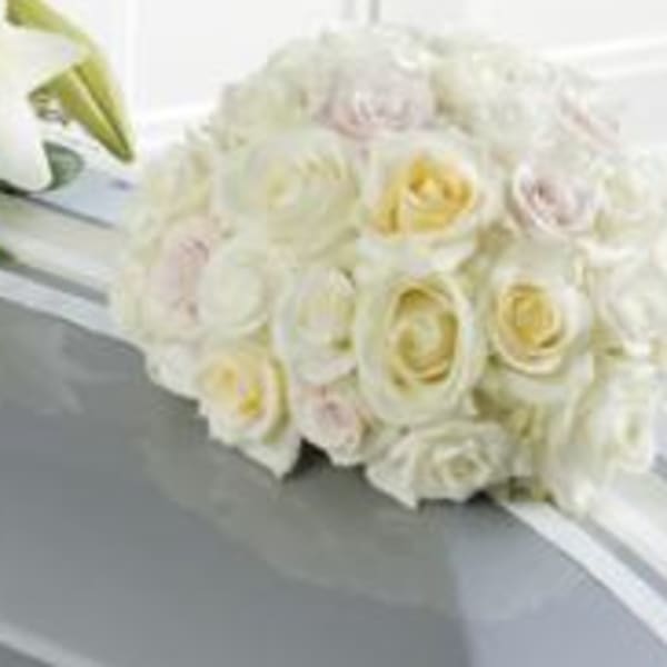 White rose bouquet with pale yellow centers