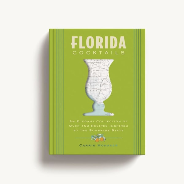 Green cookbook titled Florida Cocktails with a map-shaped glass illustration