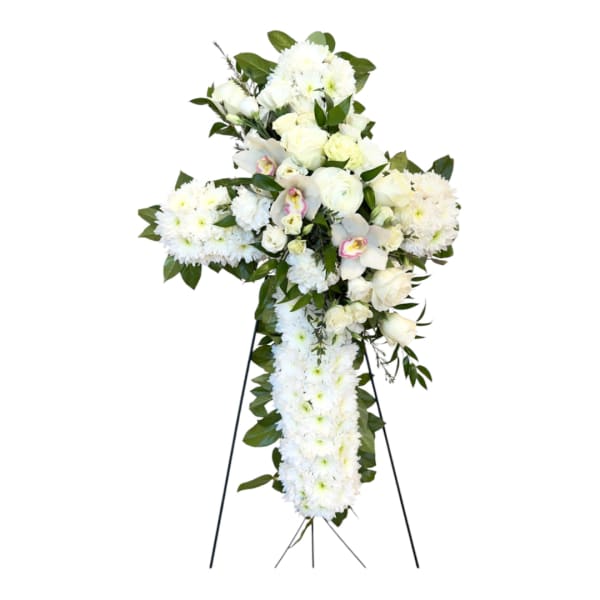 White funeral standing spray on a black easel