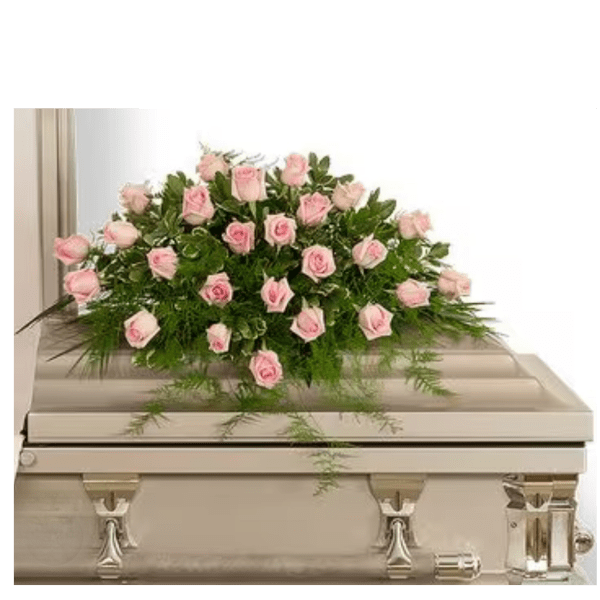 Pink roses arranged on a white casket