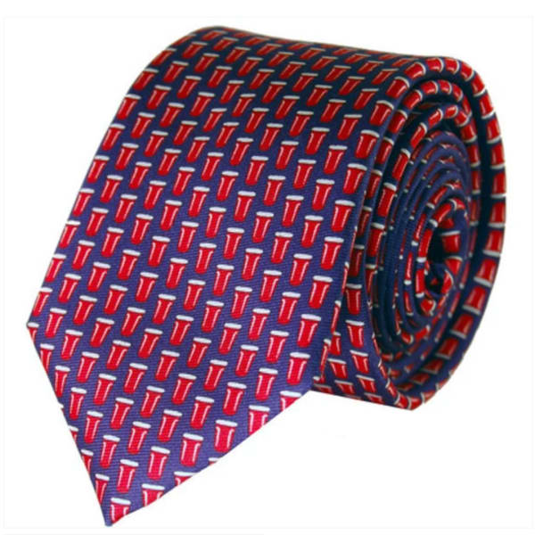 Rolled blue necktie with a red cup pattern