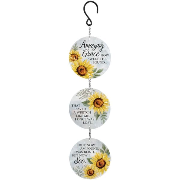 Hanging decorative sign with three sunflower discs and a black hook
