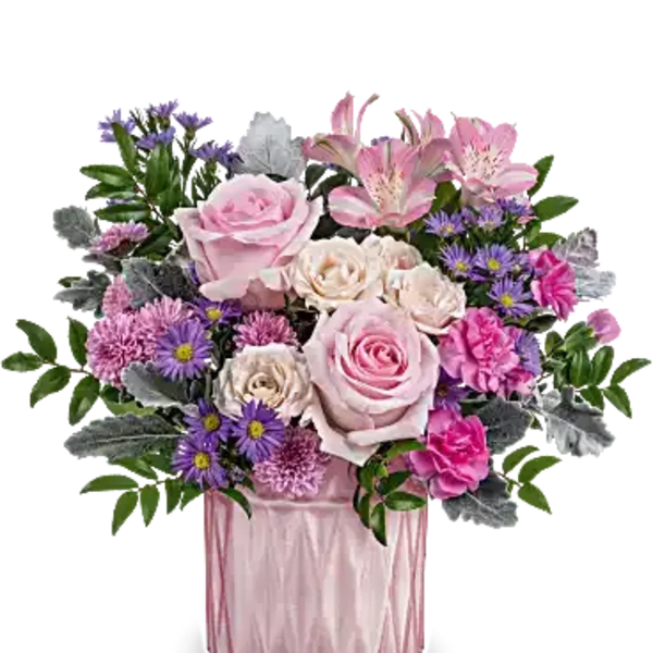Pink and purple mixed flower arrangement in a pink vase