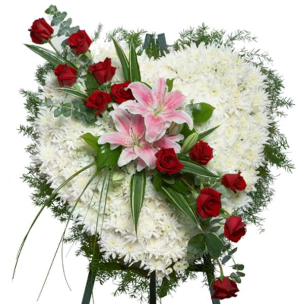 Standing floral spray with red roses, pink lilies, and white chrysanthemums