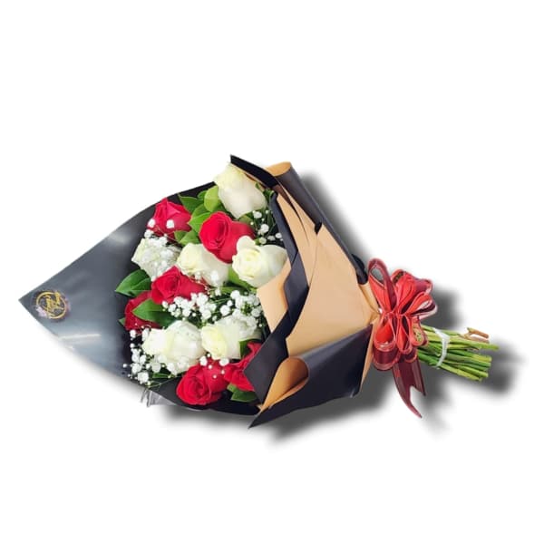 Bouquet of red and white roses wrapped in black and tan paper