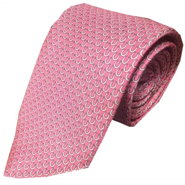 Pink patterned necktie on a white background