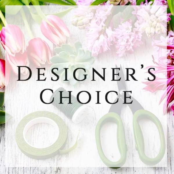 Designer’s Choice text over a floral background with pink tulips and pale blossoms