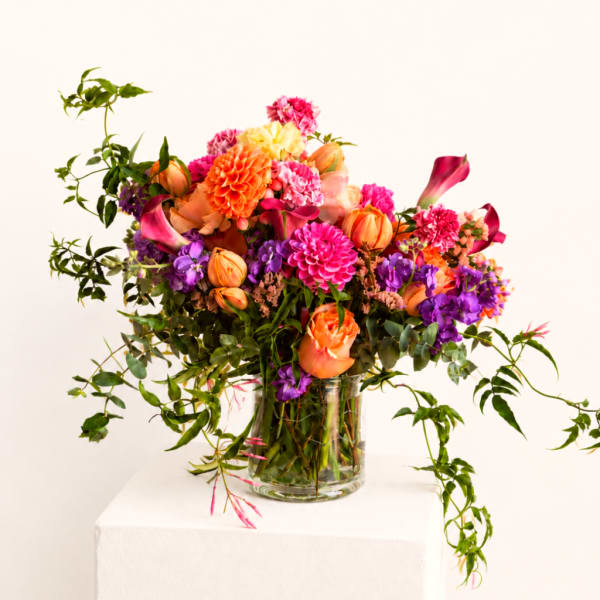 Colorful mixed bouquet in a clear glass vase