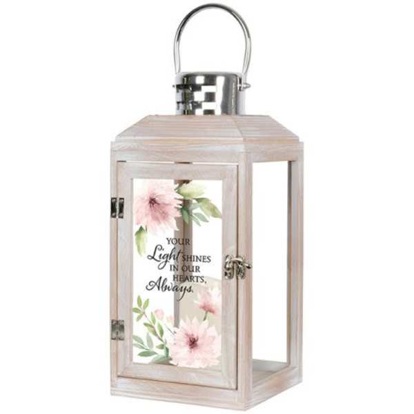 Wooden lantern with floral print and a metal handle