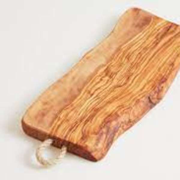 Wooden serving board with a clear handle on a white background