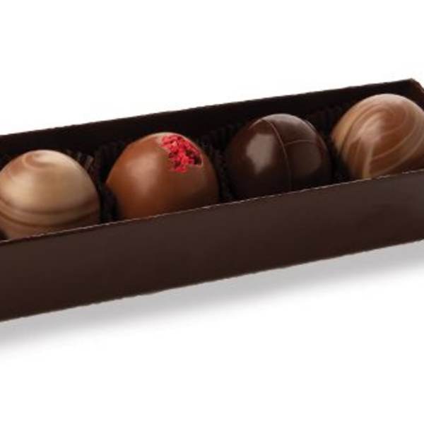 Box of assorted chocolate truffles in a long brown gift box