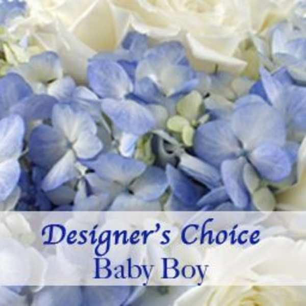 Blue and white hydrangea bouquet with a "Designer’s Choice Baby Boy" label