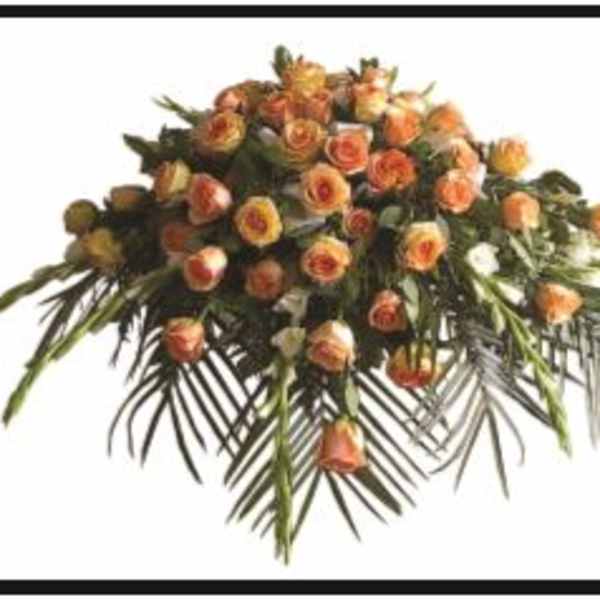 Orange roses arranged in a large cascading spray
