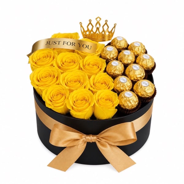 Yellow roses and gold-wrapped chocolates in a black gift box with a ribbon
