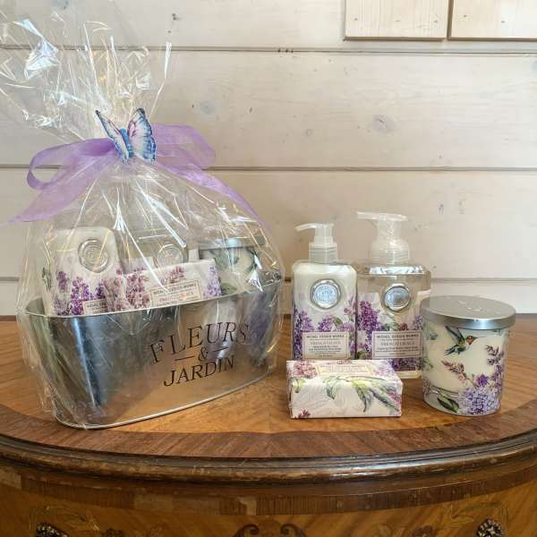 Gift basket with lavender bath products and a candle