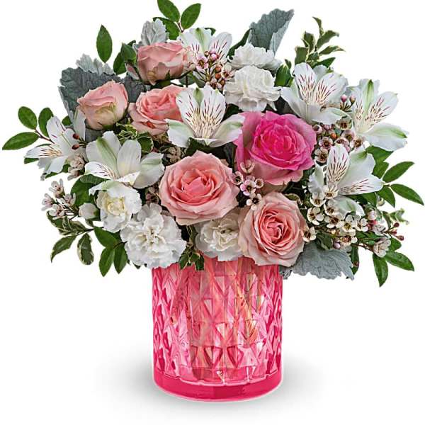 Pink and white bouquet in a bright pink textured vase