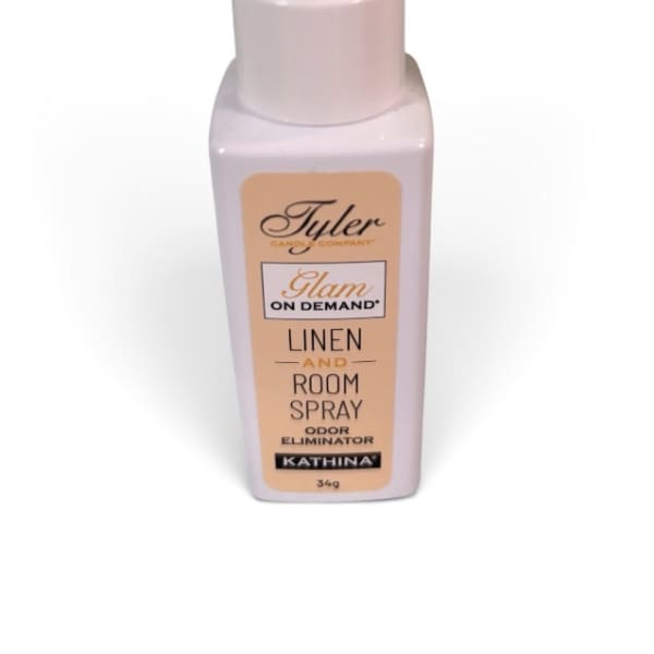 Pink room spray bottle with a labeled cap