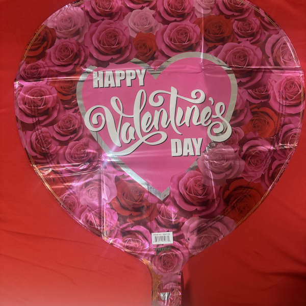 Heart-shaped Valentine’s Day balloon with pink roses and red background