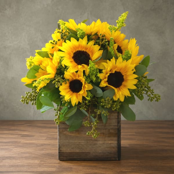 Sunflower arrangement in a rustic wooden box