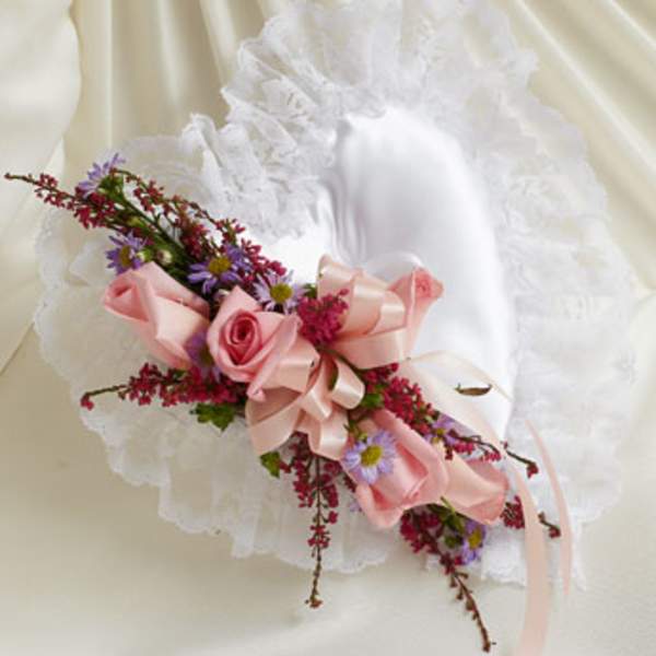 Pink rose bouquet with purple daisies and a satin ribbon
