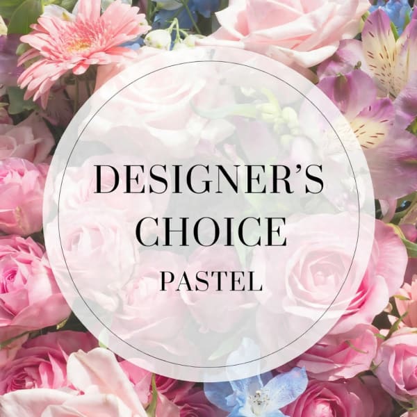 Pastel floral arrangement with pink roses and mixed blooms