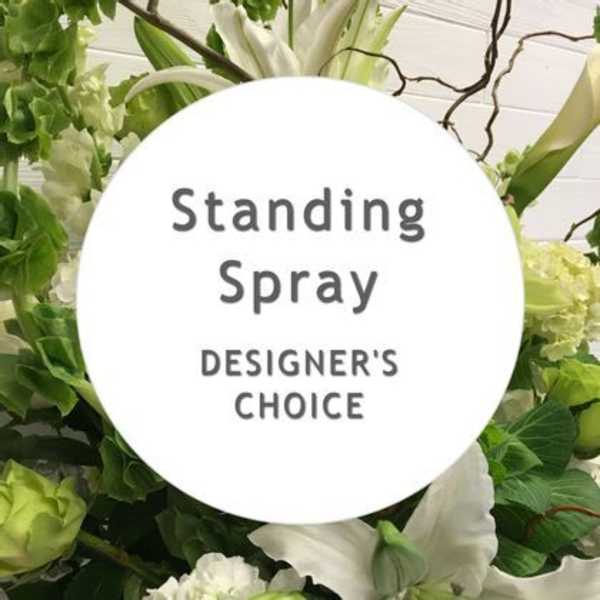 Standing spray with white flowers and green accents