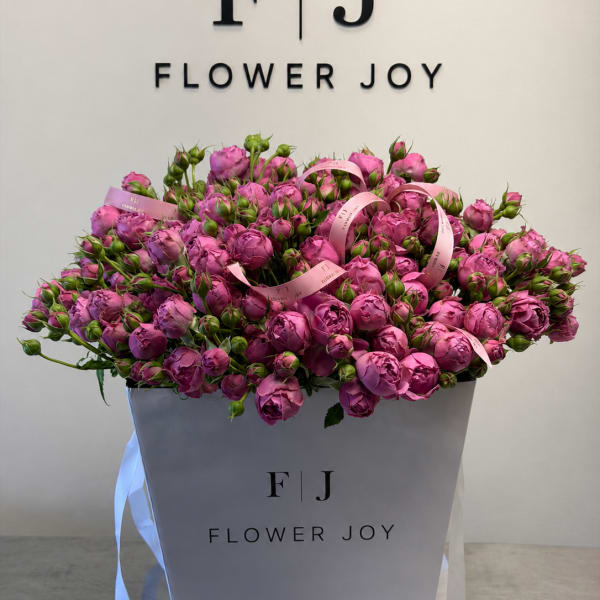 Large bouquet of pink spray roses in a white gift box