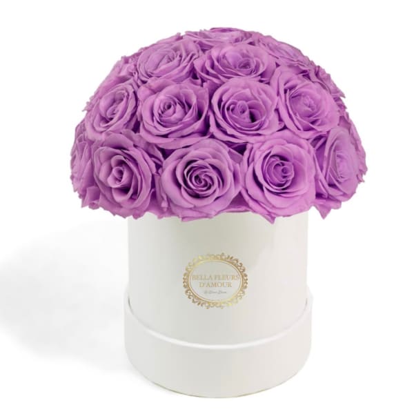 Purple roses arranged in a white round box