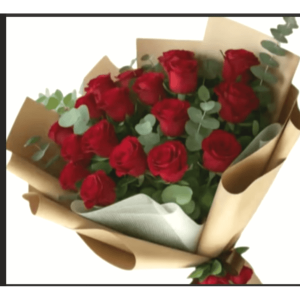 Bouquet of red roses wrapped in brown paper