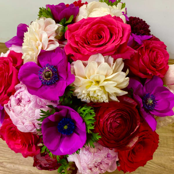 Bright bouquet of pink, red, white, and purple flowers