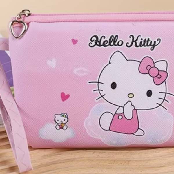 Pink Hello Kitty zip pouch with a wrist strap