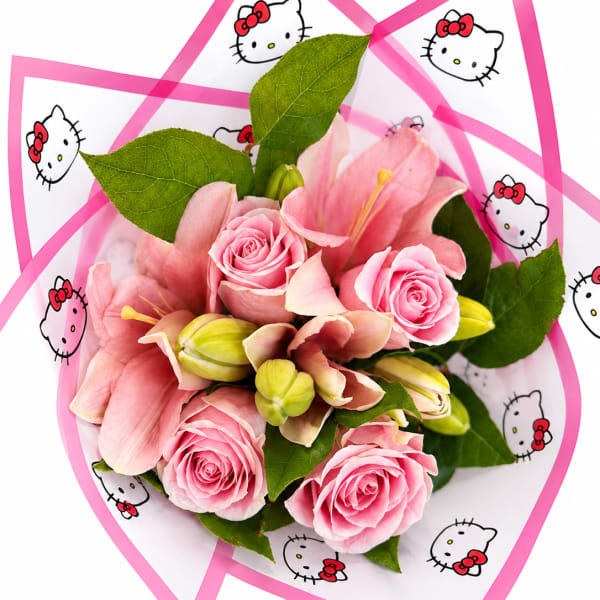 Pink roses and lilies wrapped in Hello Kitty paper