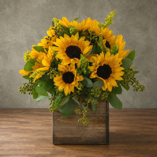 Sunflower arrangement in a rustic wooden box